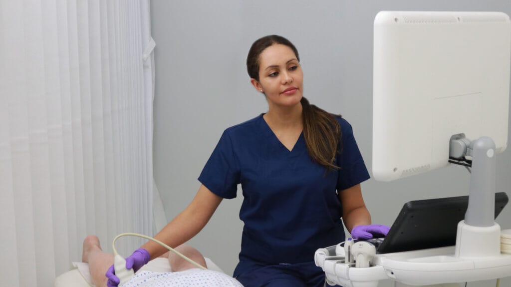 Professor Johnson guiding a patient through the recovery process after a diagnostic evaluation.